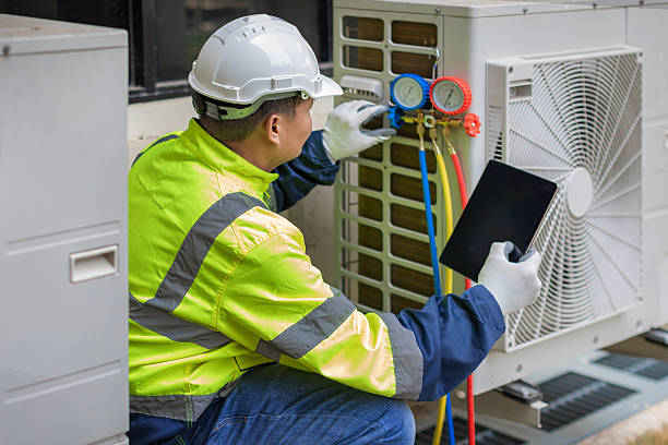 Professional Air Duct Cleaning technician working in Mogadore, OH